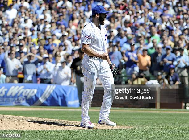 Jake Arrieta of the Chicago Cubs reacts after striking out Matt Joyce of the Pittsburgh Pirates for the final out with the bases loaded during the...