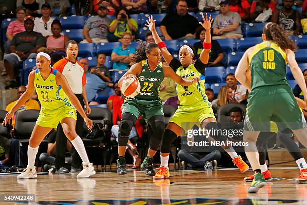 Monica Wright of the Seattle Storm handles the ball against the Dallas Wings on June 16, 2016 at College Park Center in Arlington, Texas. NOTE TO...