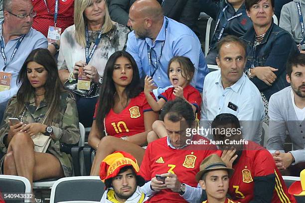 Daniella Semaan wife of Cesc Fabregas and their daughter Lia Fabregas attend the UEFA EURO 2016 Group D match between Spain and Turkey at Allianz...