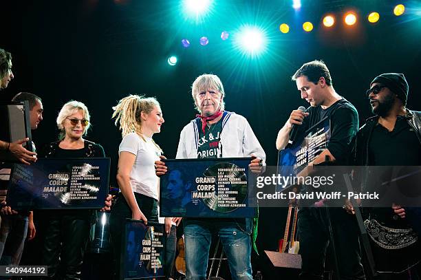 Veronique Sanson, Renaud, Grand corps malade, and Lino are receiving a reward on stage at Le Trianon on June 17, 2016 in Paris, France.