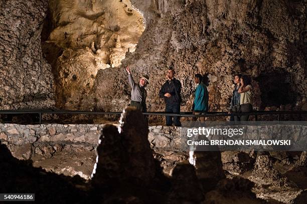 Park Ranger gives US President Barack Obama , Sasha Obama , first lady Michelle Obama and Malia Obama a tour of Carlsbad Caverns National Park on...