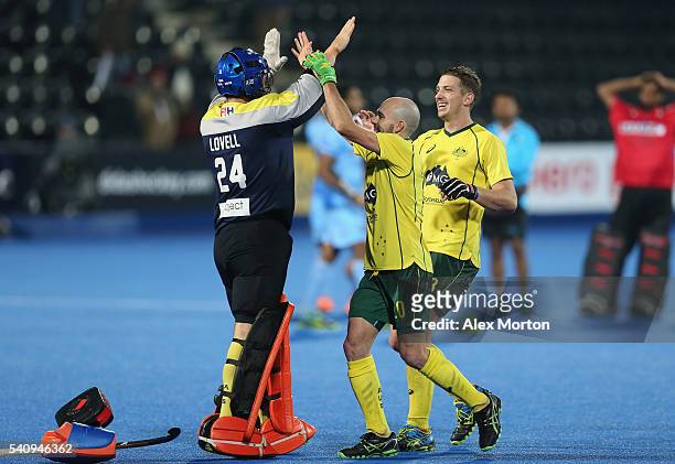 Tyler Lovell of Australia celebrates at the end of the match with team mates Matthew Swan and Simon Orchard during the FIH Mens Hero Hockey Champions...