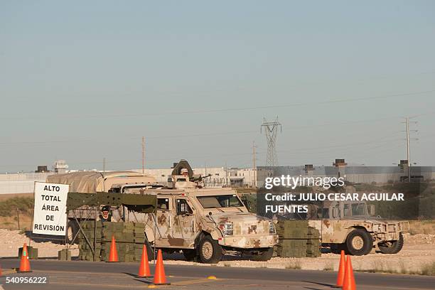 Members of the Mexican Army guard the access to the Federal Centre of Social Readaptation 9 where prisoner Joaquin Guzman Loera, aka El Chapo, is...