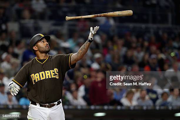 Matt Kemp of the San Diego Padres throws his bat after striking out during the fifth inning of a baseball game against the Washington Nationals at...