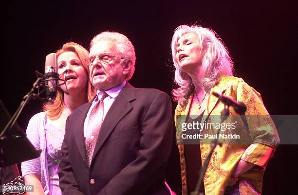 From left, American musicians Patty Loveless, Ralph Stanley, and Emmylou Harris perform together onstage, Chicago, Illinois, July 22, 2002.