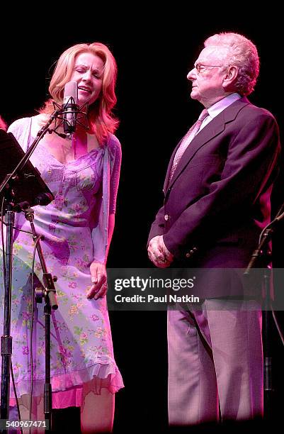 American country musicians Patty Loveless and Ralph Stanley perform together onstage, Chicago, Illinois, July 22, 2002.