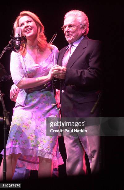 American country musicians Patty Loveless and Ralph Stanley perform together onstage, Chicago, Illinois, July 22, 2002.