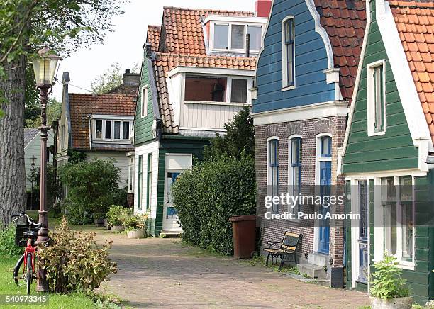 Traditional Dutch Houses In Amsterdam High-Res Stock Photo - Getty
