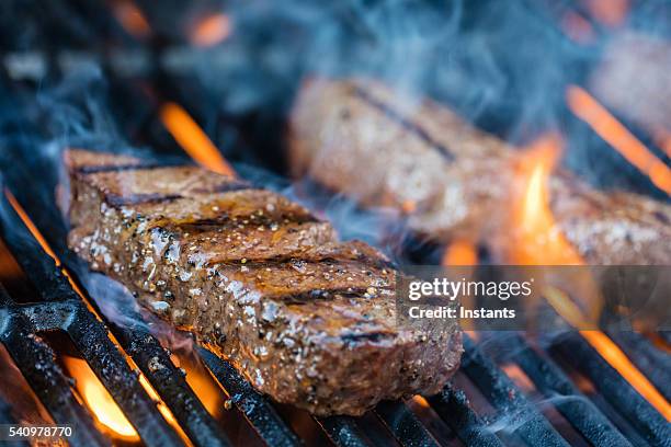 sirloin steaks on the bbq - beef stock pictures, royalty-free photos & images