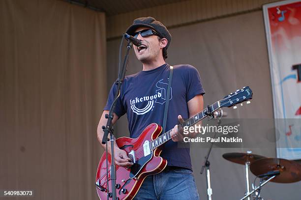 American musician Jakob Dylan, of the Wallflowers, plays guitar as he performs onstage, Chicago, Illinois, July 4, 2003.