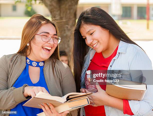 multi-ethnic group of high school or college girls talking.  campus. - infödd amerikan bildbanksfoton och bilder
