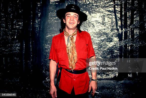 Portrait of American musician Stevie Ray Vaughan backstage at the Metro, Chicago, Illinois, July 3, 1983.