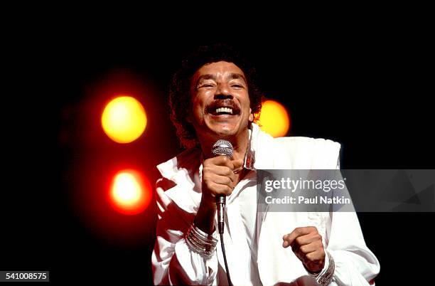 American singer Smokey Robinson performs onstage at the Aire Crown Theater, Chicago, Illinois, September 1, 1984.