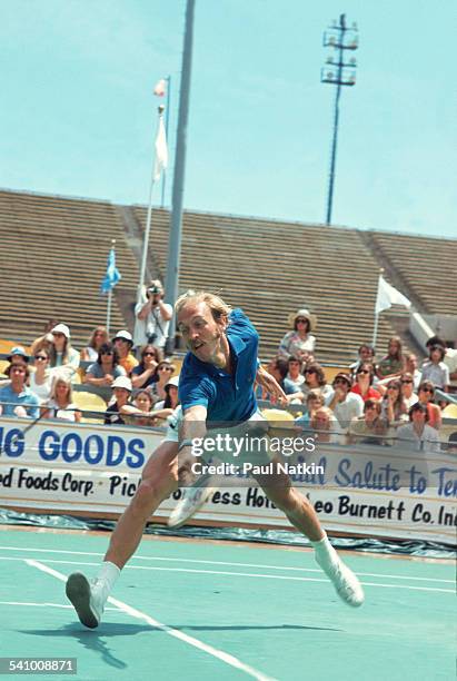 American tennis player Stan Smith returns a shot during a match, Chicago, Illinois, 1976.