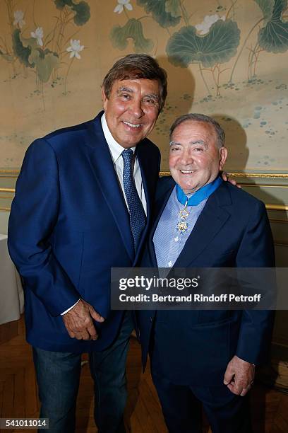 Jean-Pierre Foucault and Levon Sayan attend Levon Sayan receives Insignia of "Commandeur de l'Ordre National du Merite" at Hotel d'Evreux on June 14,...