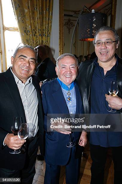 Levon Sayan standing between Michel Acaries and his brother Louis Acaries attend Levon Sayan receives Insignia of "Commandeur de l'Ordre National du...
