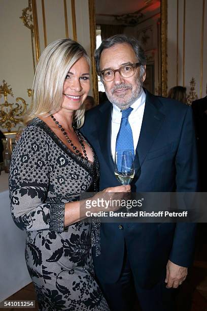 President of TF1 Nonce Paolini and Catherine Falgayrac attend Levon Sayan receives Insignia of "Commandeur de l'Ordre National du Merite" at Hotel...