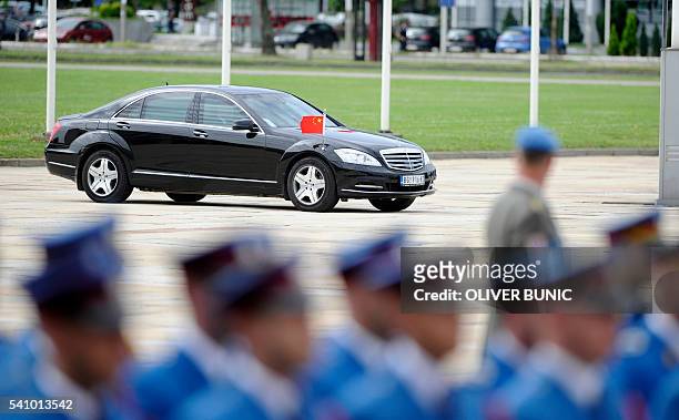 Chinese President Xi Jinping arrives to meet his Serbian counterpart in Belgrade on June 2016. Chinese President Xi Jinping holds official talks with...