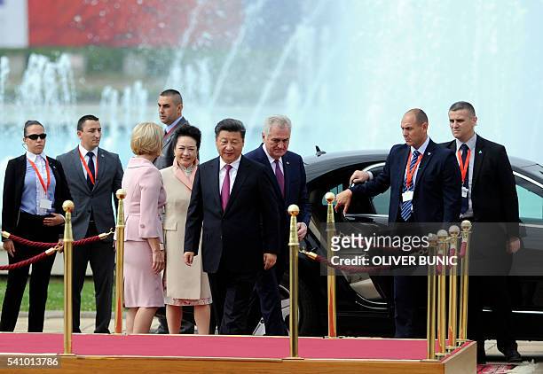 Chinese President Xi Jinping is welcomed by Serbian President Tomislav Nikolic before their meeting in Belgrade on June 2016. Chinese President Xi...