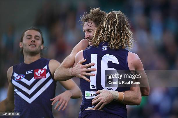 Michael Barlow and David Mundy of the Dockers celebrate a goal during the round 13 AFL match between the Fremantle Dockers and the Port Adelaide...