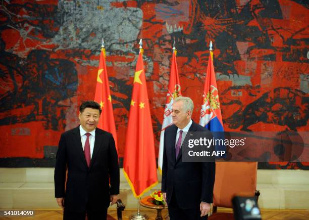 Chinese President Xi Jinping meets Serbian President Tomislav Nikolic at the Palace of Serbia in Belgrade on June 18, 2016. - Chinese President Xi...