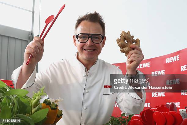 Holger Stromberg, chef of the German national team pose after a show cooking event after a Germany press conference at Ermitage Evian on June 18,...