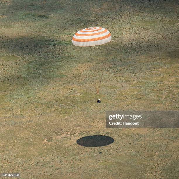 The Soyuz TMA-19M spacecraft is seen as it lands with Expedition 47 crew members Tim Kopra of NASA, Tim Peake of the European Space Agency, and Yuri...