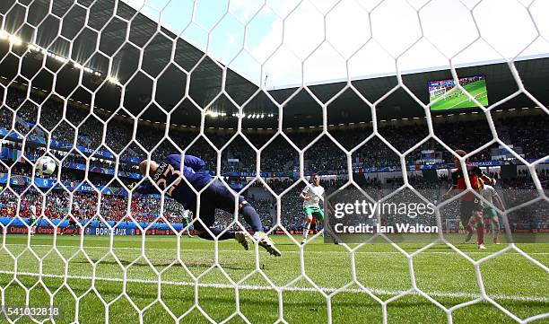 Axel Witsel of Belgium scores his team's second goal past Darren Randolph of Republic of Ireland during the UEFA EURO 2016 Group E match between...