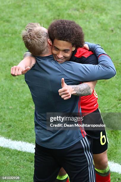 Axel Witsel of Belgium celebrates with Marc Wilmots manager of Belgium after he scores his team's second goal during the UEFA EURO 2016 Group E match...