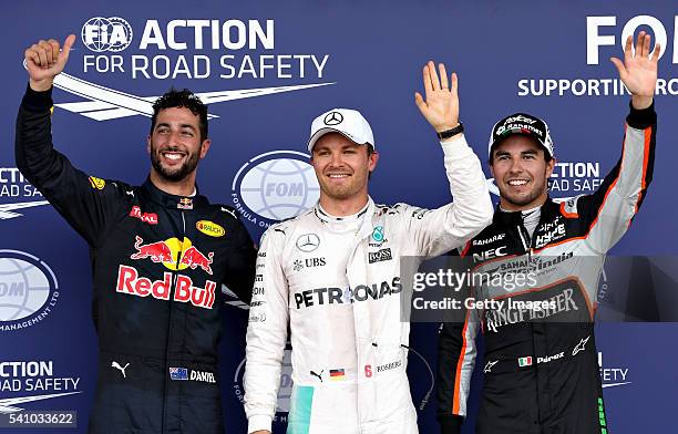 Top three qualifiers, Nico Rosberg of Germany and Mercedes GP, Sergio Perez of Mexico and Force India and Daniel Ricciardo of Australia and Red Bull...