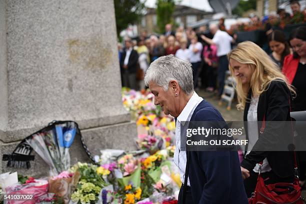 Jean and Kim Leadbeater , the mother and sister of murdered Labour MP Jo Cox, view the floral tributes left to Jo near to the location where she was...