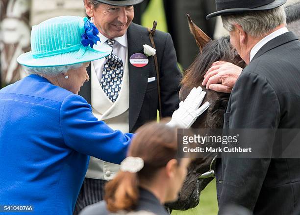 Queen Elizabeth II with her horse Dartmouth which won The Hardwick Stakes on day 5 of Royal Ascot at Ascot Racecourse on June 18, 2016 in Ascot,...