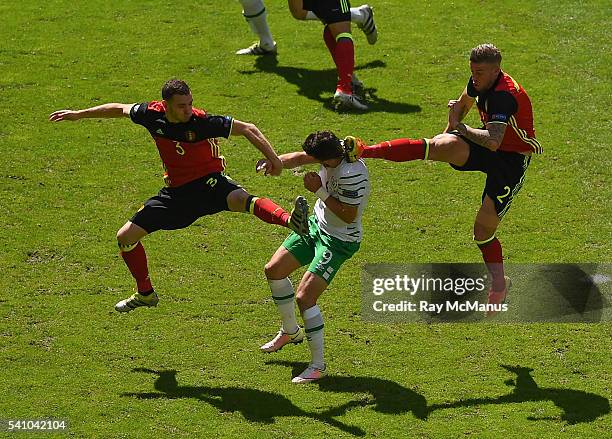 Bordeaux , France - 18 June 2016; Shane Long of Republic of Ireland in action against Thomas Vermaelen, left, and Toby Alderweireld of Belgium during...