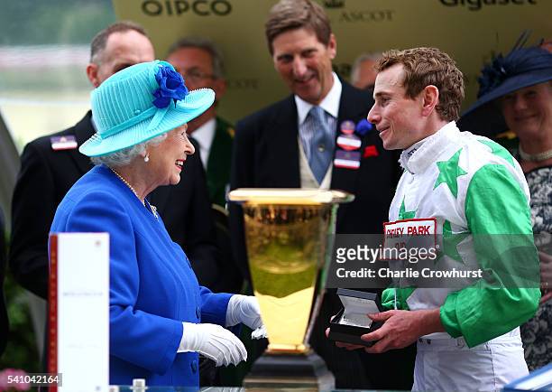 Queen Elizabeth II presents the Diamond Jubilee Stakes to Ryan Moore on day 5 of Royal Ascot at Ascot Racecourse on June 18, 2016 in Ascot, England.