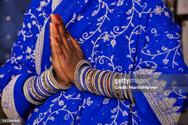 indian woman wearing multiple bangles - bangle stock pictures, royalty-free photos & images