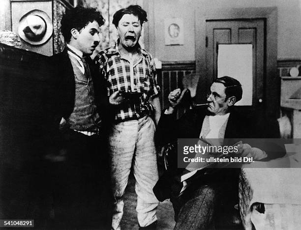Chaplin, Charlie - Actor, film director, Great Britain - *16.04.1889-+ Scene from the movie 'The Tramp' with Paddy McGuire and Fred Goodwins Directed...