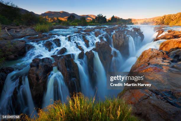 epupa falls on the kunene river - namibia landscape stock pictures, royalty-free photos & images
