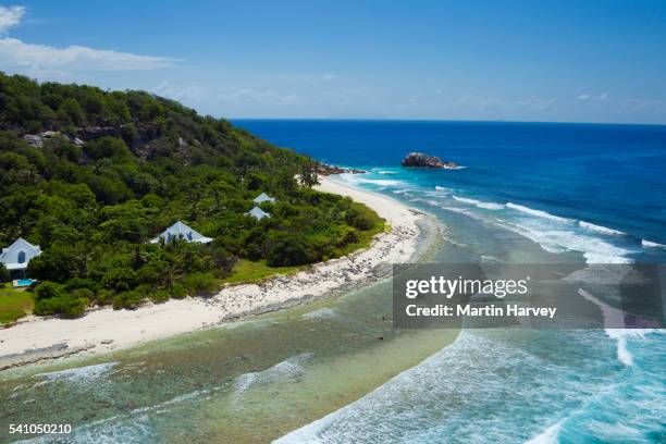 aerial view of cousine island.seychelles - private island stock-fotos und bilder