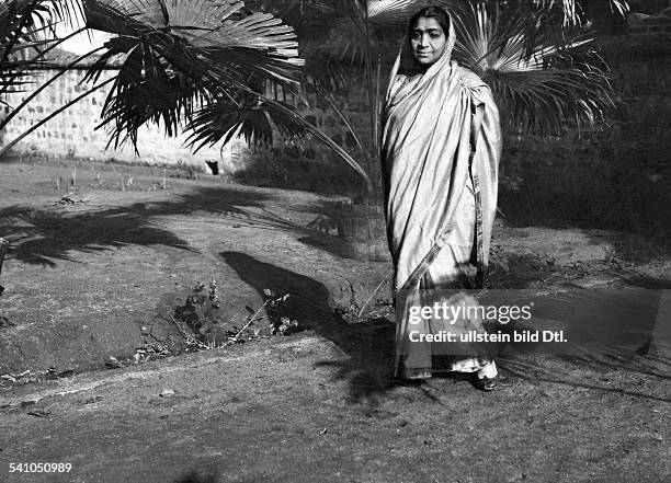 Sarojini Naidu, politican, writer, suffragette India. During a meeting of the parliment of India 1928