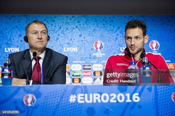 In this handout image provided by UEFA, Head coach Giovanni de Biasi and Etrit Berisha of Albania attend a press conference on June 18, 2016 in...
