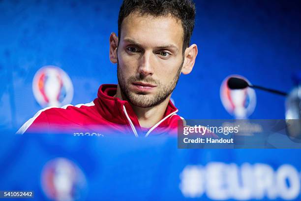 In this handout image provided by UEFA, Etrit Berisha of Albania attends a press conference on June 18, 2016 in Decines-Charpieu, France.