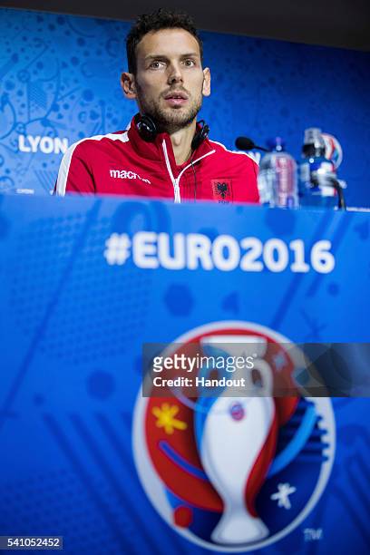 In this handout image provided by UEFA, Etrit Berisha of Albania attends a press conference on June 18, 2016 in Decines-Charpieu, France.