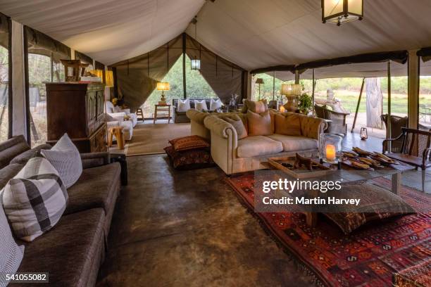tented lounge area of luxury machaba camp. okavango delta.botswana - botsuana stock-fotos und bilder