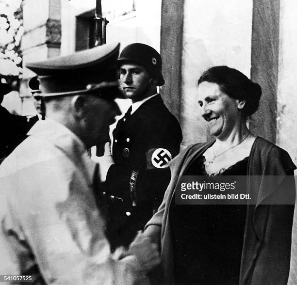 Adolf Hitler*20.04.1889-+Politician, Nazi Party, Germanywelcomed by Winifred Wagner in front of the Bayreuth Festspielhaus on the opening of the...