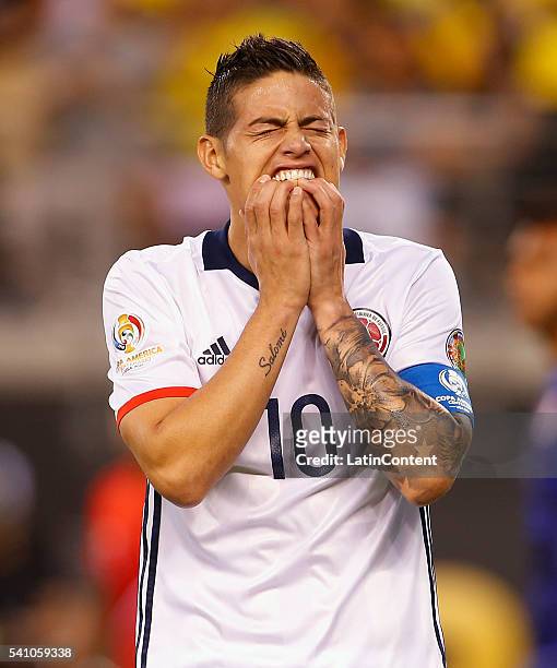 James Rodriguez of Colombia reacts after missing a chance to score in the first half against Peru during a Quarterfinal match at MetLife Stadium as...