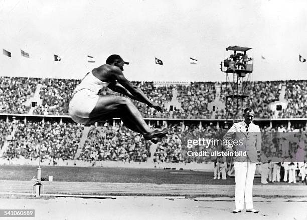 James Cleveland OWENS, American athlete, quadruple Olympic champion in Berlin 1936Olympic Summer Games in Berlin 1936: Owens wins the gold medal and...