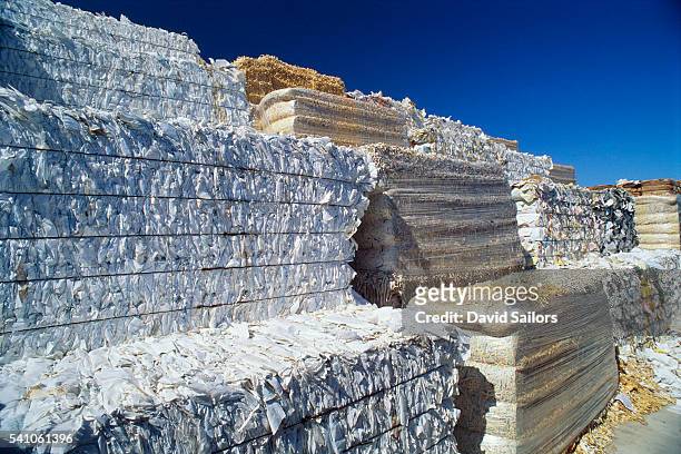 bales of paper ready for recycling - recycled paper stock pictures, royalty-free photos & images