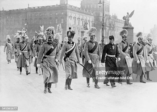 German Emperor and king of Prussia with his sons walking from the 'Berliner Schloß' to the armoury. From left: Wilhelm II, Crown Prince Friedrich...