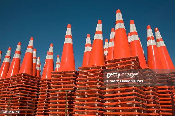 stacks of traffic cones - traffic cone stock pictures, royalty-free photos & images