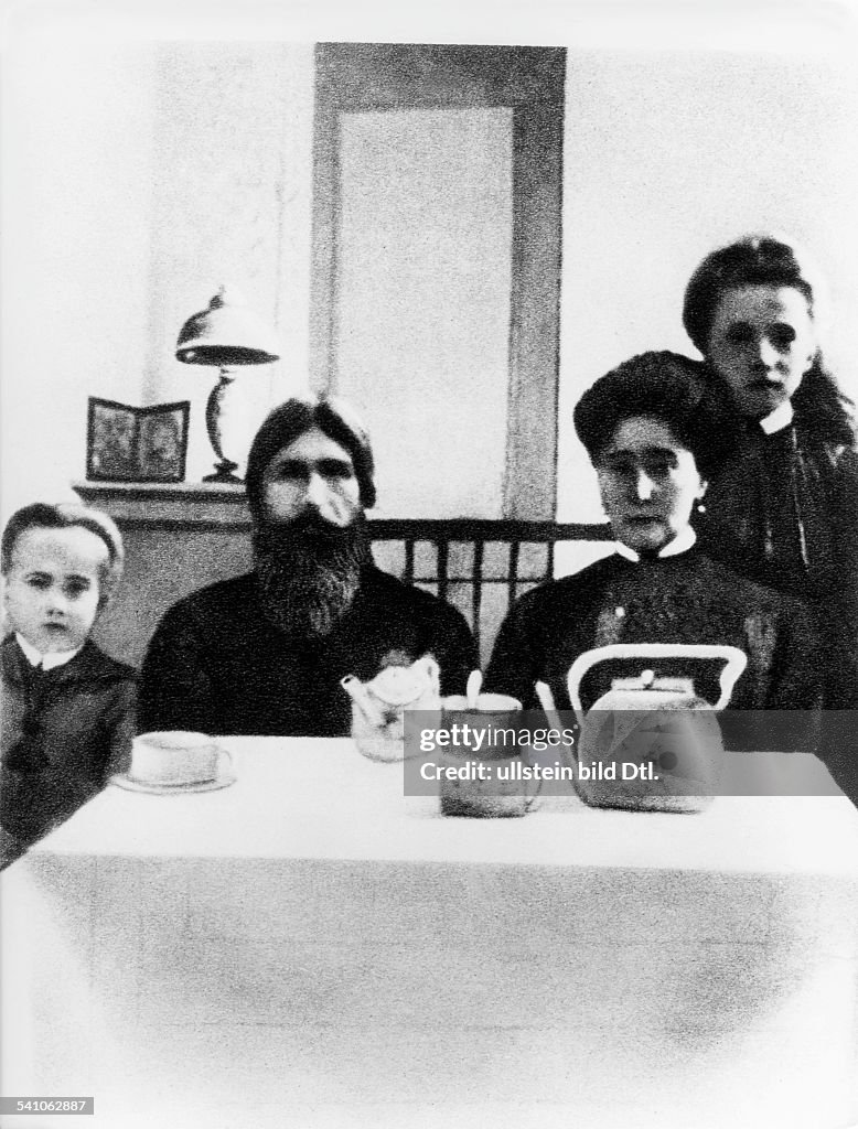 Grigori Rasputin *22.01.1869-30.12.1916+monk, faith healer, Russia - with Tsarina Alexandra Romanov and her son Alexei at the Alexander Palace in St. Petersburg, Russia, 1916.